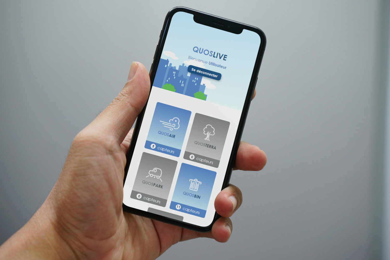 Man-holding-iPhone-X